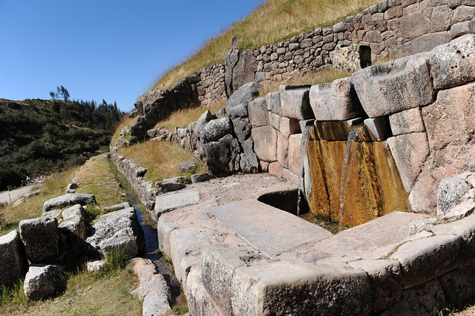 Cusco City Sightseeing and Sacsayhuaman Archeological Park Tour - Sacsayhuaman Over Cusco: 13-Foot Stones and Inca Symbol Carving