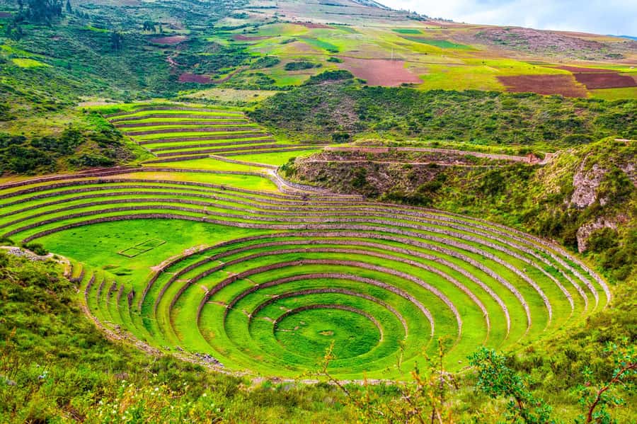 Cusco: Maras and Moray Tour ending in Ollantaytambo - Moray’s circular terraces in sinkholes: a living lab in limestone