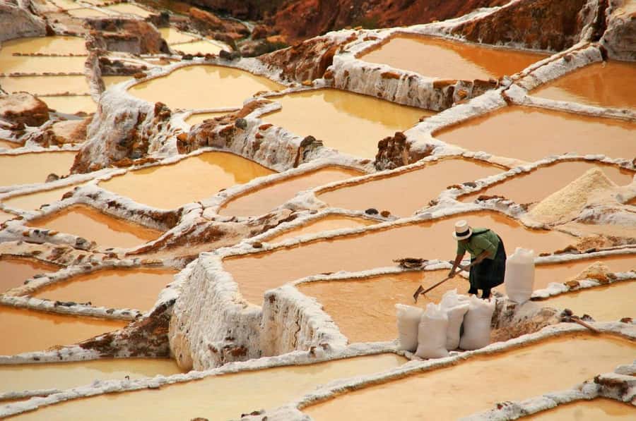 Cusco: Moray, Maras Salt Mines, and Chinchero Weavers Tour - Maras Village: Thin-Stone Colonial Buildings in a Working Valley