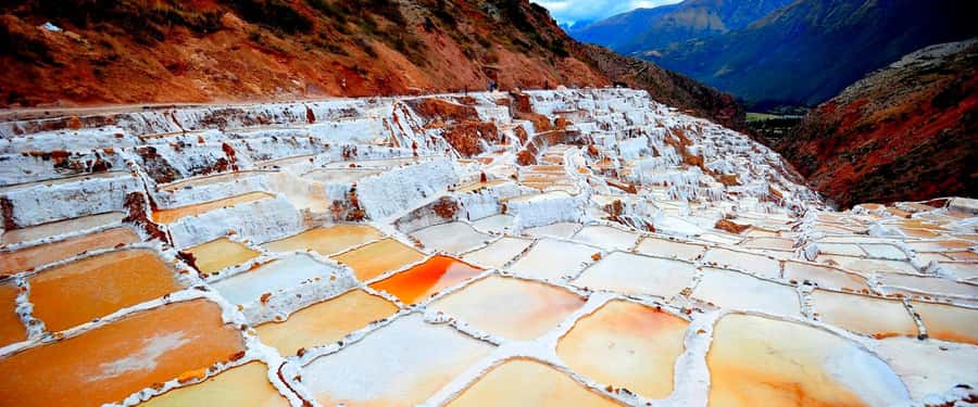 From Cusco: Maras Salt Mines and Moray Half-Day Tour - Languages: English, Spanish, and Quechua Help You Connect Faster