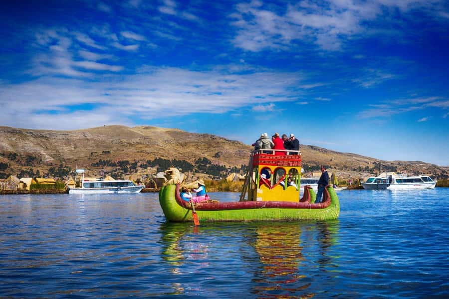 From Cusco: Titicaca Lake - Full day tour with sleeper bus - Taquile island: markets, photos, and a family lunch