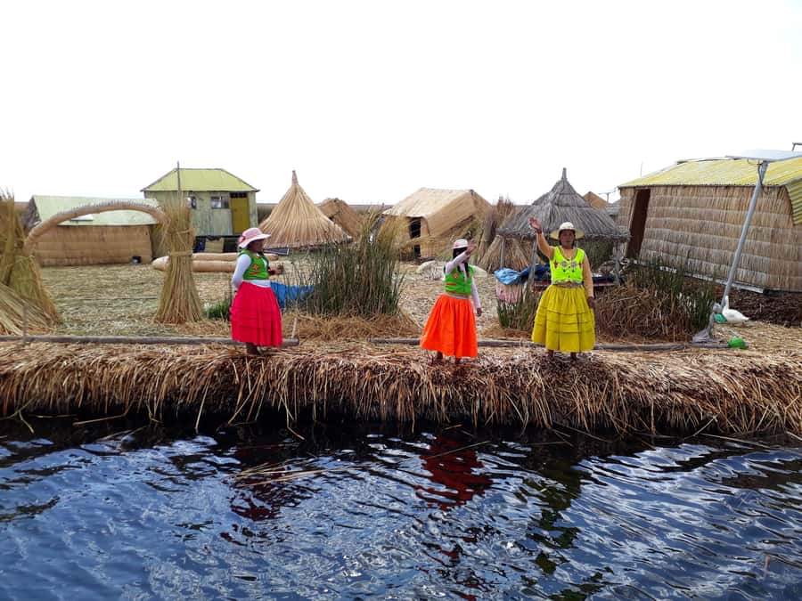 From Puno: full day tour to Uros and Taquile with Lunch - Uros Floating Islands: Totora Built Homes and Time to Look Around