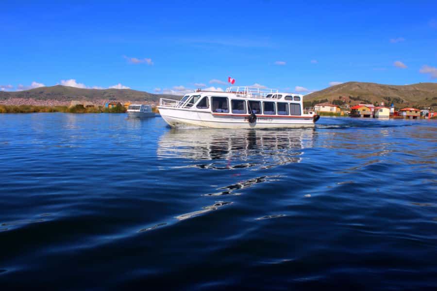 From Puno: Uros floating islands half Day tour - The guide and communication: English and Spanish that actually helps