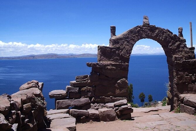 Full-Day Tour of Uros, Taquile and Sillustani from Puno - Stop 2: Taquile Island Textiles, Community, and a 30-Minute Uphill Walk