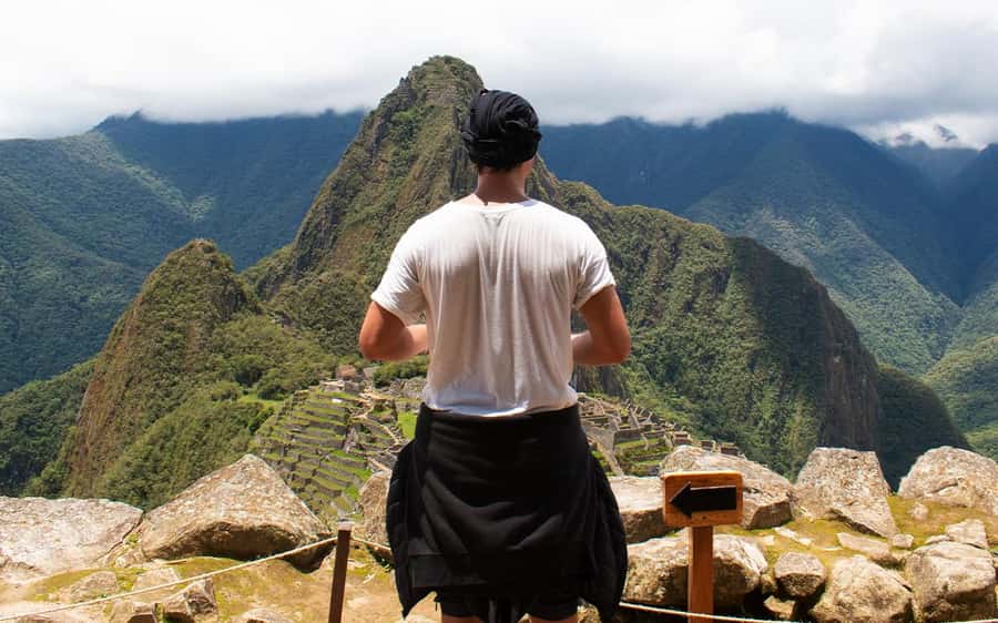 Machupicchu tour by tourist train in 2 days - Aguas Calientes free afternoon: town time, hot springs option, and an evening briefing