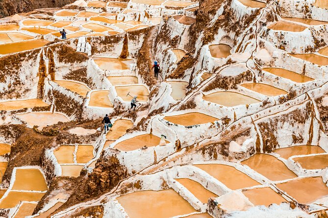 Moray and Maras Salt Mines Full Day Tour - Small Groups - Maras town: colonial-style doors and Andean continuity