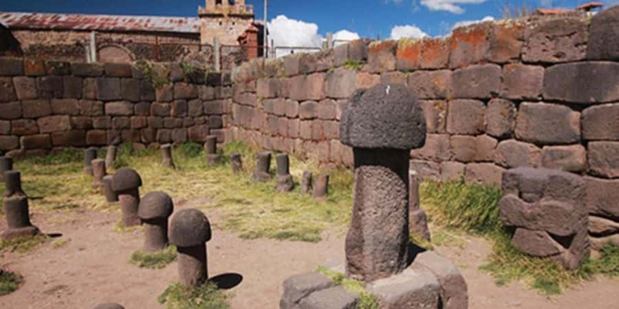 Puno: Chucuito, Aramu Muru, and Juli Day Trip - Molloco chullpas and Waru Waru Andinos: where history meets engineering