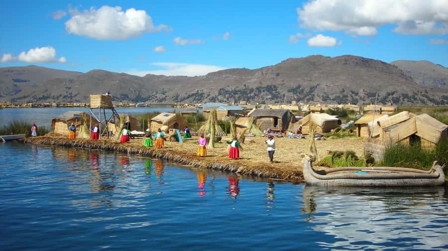 Puno: Lake Titicaca, Uros, and Taquile Full-Day Tour - Starting in Puno: How the Van and Speedboat Set the Tone