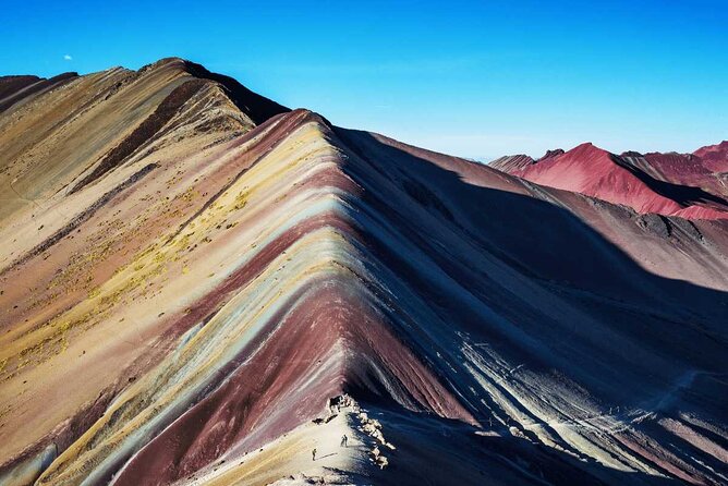 Rainbow Mountain Perú Full Day Group Shared Service - 4:00 AM pickup, bus ride, and the Cusco to Llaqto transition