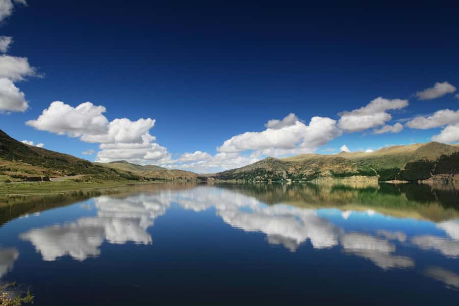 "Waqra Pucara, The Majestic Fortress Revealing Secrets of the Andes". - Pitumarca breakfast and the Pomacanchi Lagoon approach
